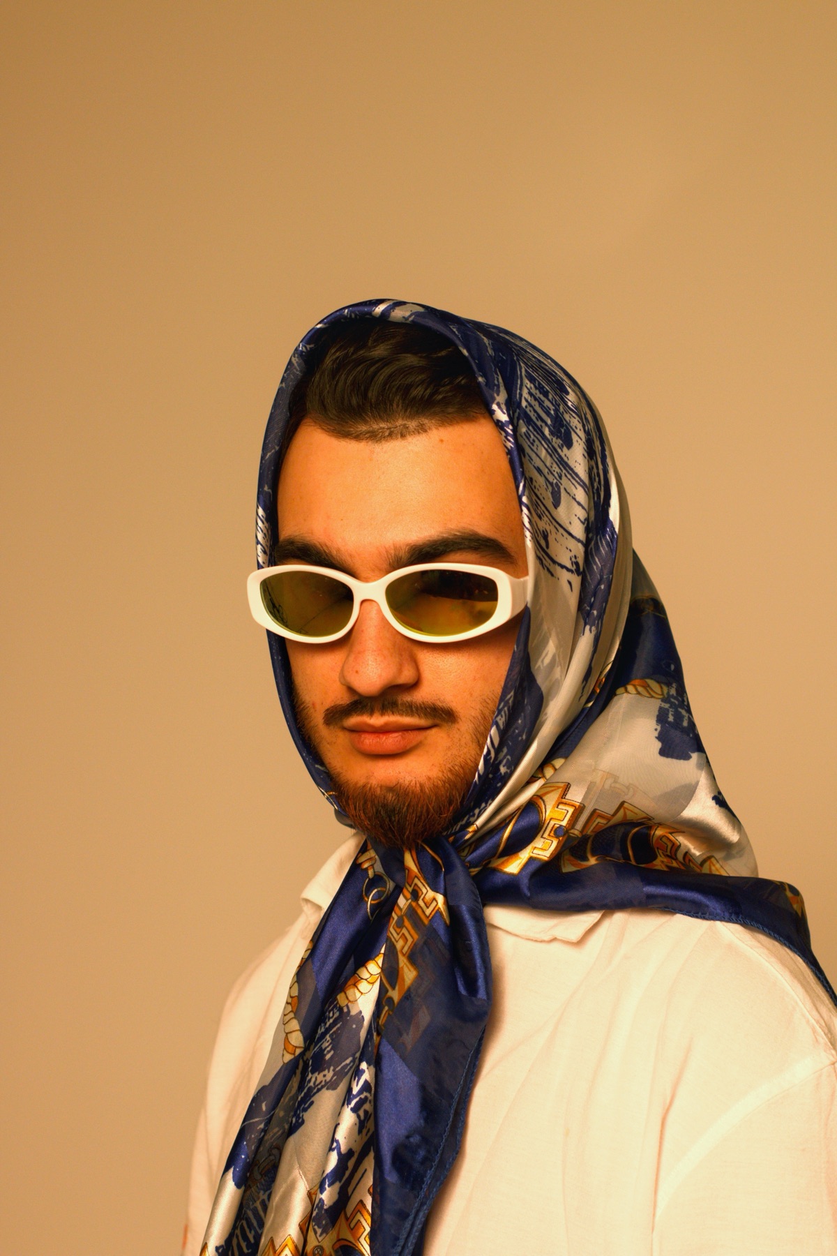 Matin Zoormand in a blue silk scarf