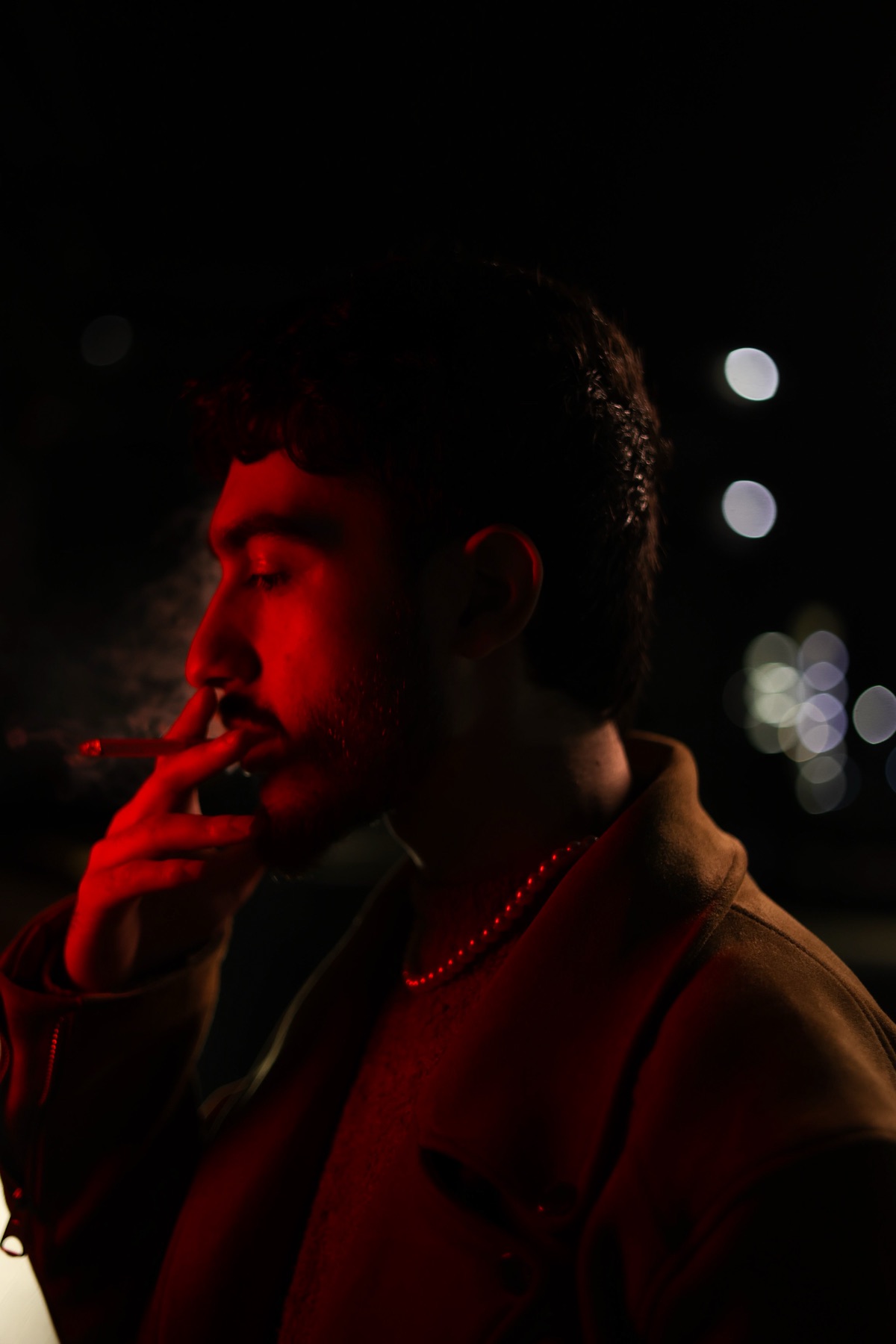 Matin Zoormand at night in red light